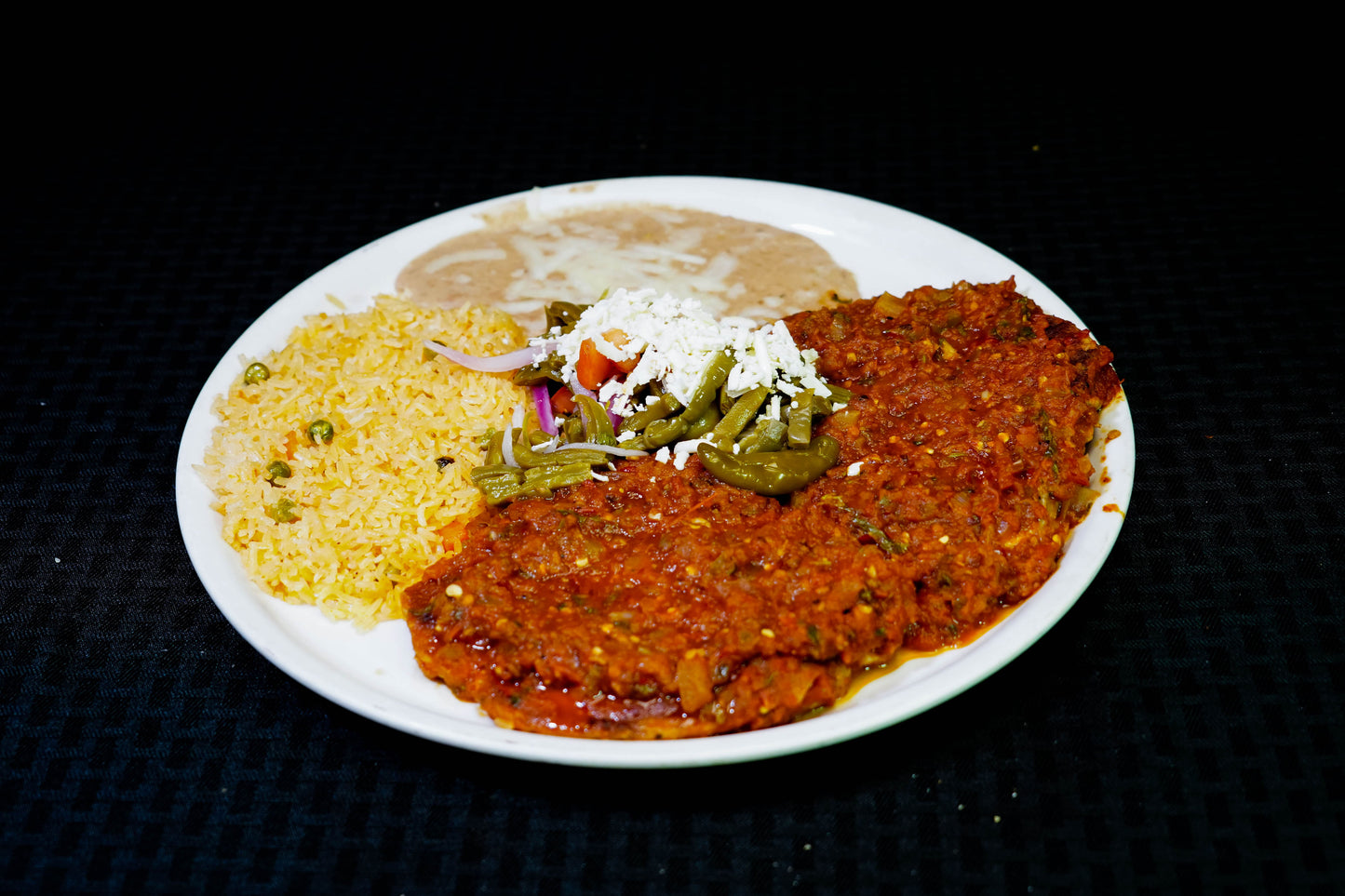 Chuletas de Puerco En Salsa Roja